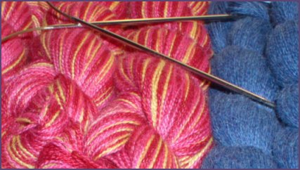 yarn hanks and knitting needles