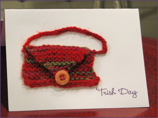 front of notecard with tiny knitted purse glued to front