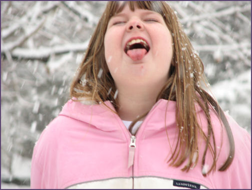 diana catching snowflakes on her tongue