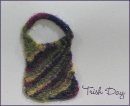 note card with felted bag on it