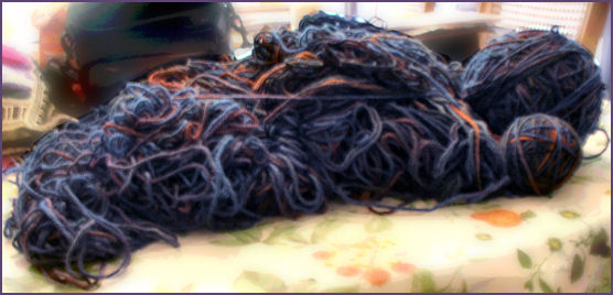 yarn in messy pile, and yarn balls