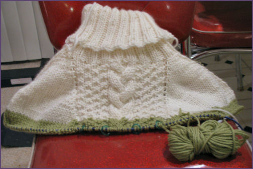 alison's poncho with green color band started