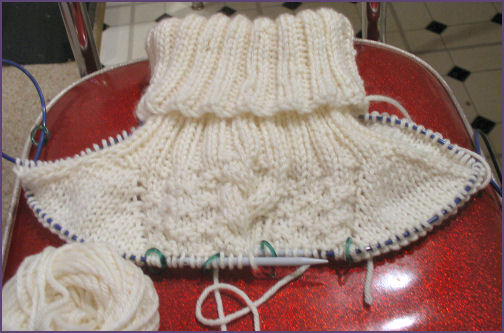 Alison's poncho, showing beginnings of patterned stitchhes