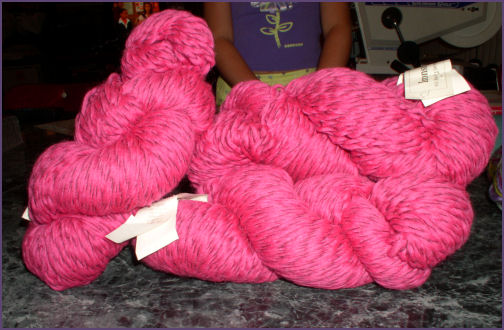 hanks of hot pink yarn