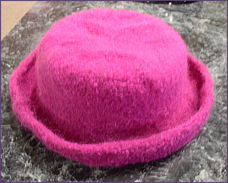 Diana's flat topped rolled brim hat after felting