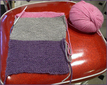 Striped knitted scarf purple gray and pink