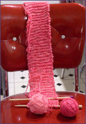 Long pink garter stitch scarf