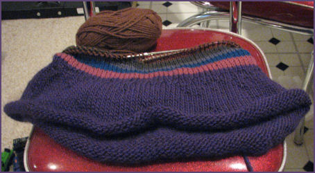 purple hat with stripes in progress