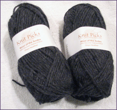 charcoal colored skeins of yarn