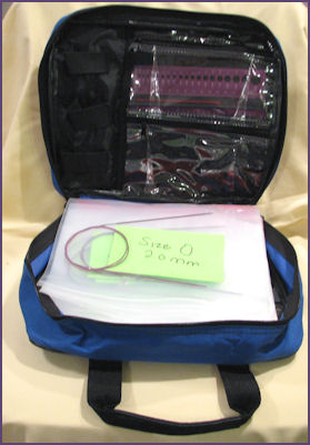 worm binder, inside, showing zipper pockets on inside front cover