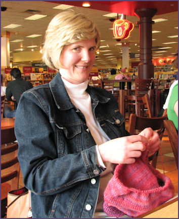 Charlotte knits a sweater