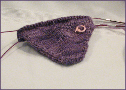 sock toe in progress with one pattern repeat