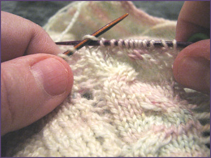 closeup of the cable section of the sweater