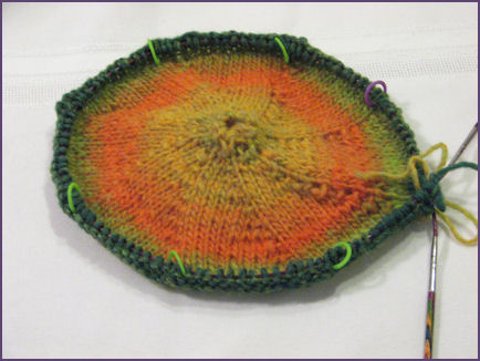 top of hat in progress with orange and green colors