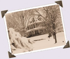 old photograph of farm house in the snow