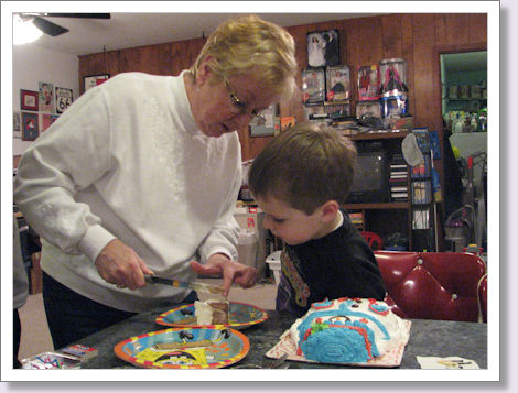 Steven and Nonna cut the cake