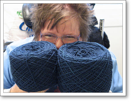 Trish with navy blue yarn all balled up