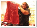 Leslie is making good progress on her sweater. Leslie is making good progress on her sweater.