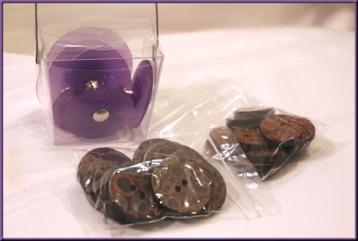 Purple pedestal buttons and a collection of cinnamon buttons