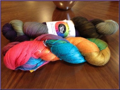 Rainbow silk and lavender and green sock yarn