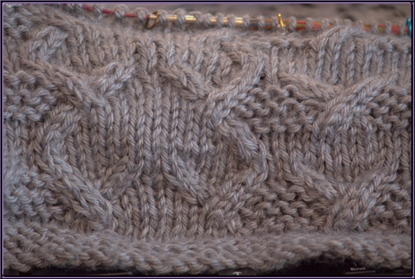 cabled knitting in progress
